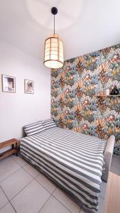 Appartements Le Nayrac l Hypercentre l Parking prive : photos des chambres