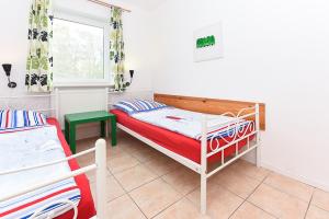 Ferienwohnung Muschel 1 mit Terrasse und Garten, Bensersiel