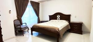 Apartamento con vistas a la piscina en Buganvillas