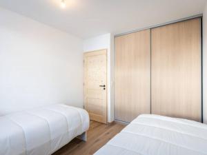 Appartements Neuf T2 avec balcon, parking et casier a skis, ideal pour 4 personnes - FR-1-291-1021 : photos des chambres