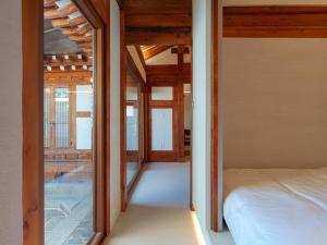 Bukchon Hanok - Yul Jae The access code is sent by message