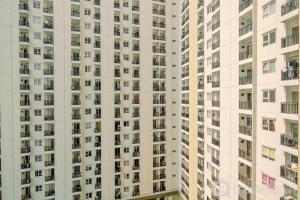 Homey and Simply 2BR Apartment at Cinere Resort By Travelio