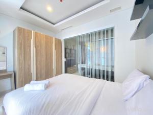Pleasant 1BR Deluxe at Dago Suites Apartment near ITB By Travelio