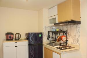 Comfort and Nice 2BR at Meikarta Apartment By Travelio