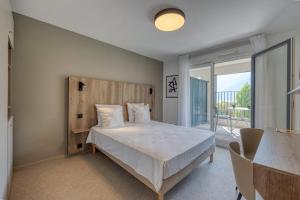 Appart'hotels KOSY APPART-HOTELS - Residence du Lac : photos des chambres