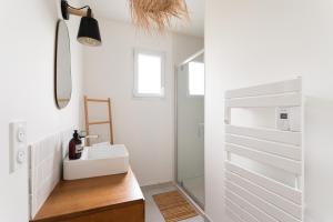 Maisons de vacances La Belle de Frehel - Jolie maison avec jardin : photos des chambres