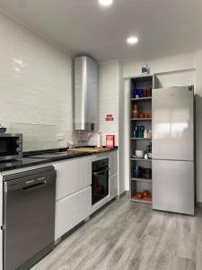 Flott sentrumsnær leilighet med egen parkering