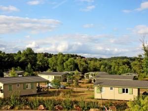 Maisons de vacances Holiday Home Les Hameaux de Miel-Chalet 6 pers- by Interhome : photos des chambres
