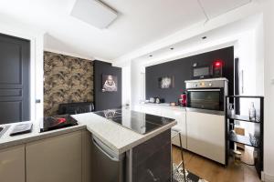 Appartements L-Evasion Design - Rooftop - 8 min Gare Orly : photos des chambres