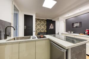 Appartements L-Evasion Design - Rooftop - 8 min Gare Orly : photos des chambres
