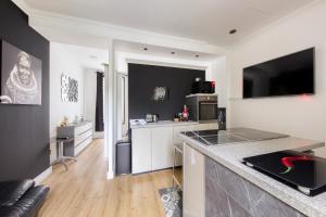 Appartements L-Evasion Design - Rooftop - 8 min Gare Orly : photos des chambres