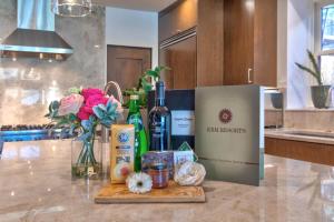 Walk to Ski Slopes Trails Luxury 4-Bedroom Private Home with Private Hot tub BBQ Heated Parking and Two Master Suites PEA-1009 by KBM Resorts