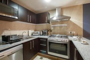 Beachfront 1BR w Balcony & Resort-Style Amenities