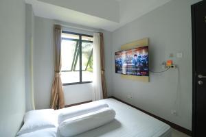 Apartemen Mungil, Nyaman, Akses Mudah