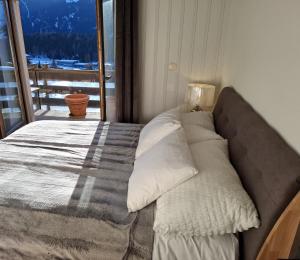 Le Nid daigle apt Leysin centre avec forfait piscine sauna jacuzzi en option