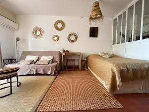 Appartements Appartement 3 pers - piscine - clim - parking : photos des chambres