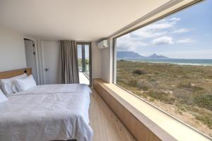 Ocean 9 - Sunset Beachfront Residency