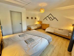 Chalets Gite 15 personnes Sauna et Spa : photos des chambres
