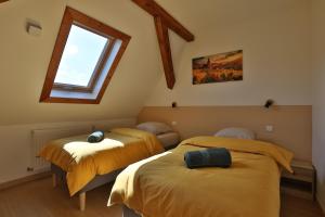 Appartements Le Cocon Vert des Vosges : photos des chambres