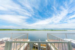 Cobertura duplex, pé na areia