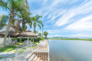 Cobertura duplex, pé na areia