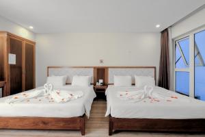 Phòng Deluxe Có 2 Giường Cỡ Queen (Deluxe Queen Room with Two Queen Beds)