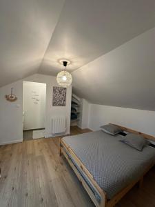 Appartements Sous les toits : photos des chambres