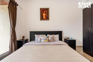 StayVista at The Green Orchid with Pool, WiFi