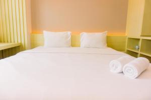 Comfortable and Modern Look 1BR at CitraLake Suites Apartment By Travelio