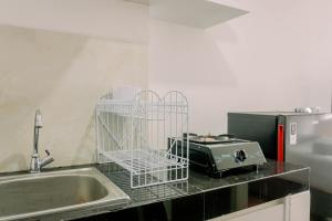 Minimalist and Best Deal Studio at Serpong Garden Apartment By Travelio