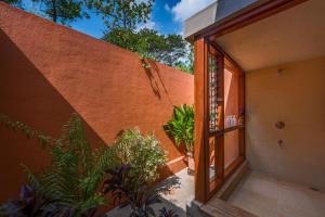 SaffronStays Laguna - 4BR vintage-chic villa with unique pool, gazebo & terrace sit-outs near Mandwa Jetty, Alibaug