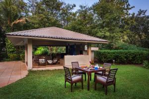 SaffronStays Laguna - 4BR vintage-chic villa with unique pool, gazebo & terrace sit-outs near Mandwa Jetty, Alibaug