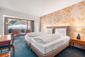 Superior Room with 2 Single Beds and Balcony room in Le Bristol Leukerbad