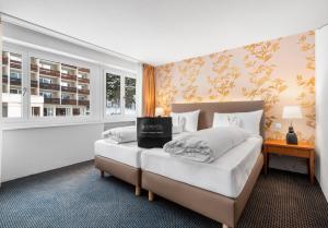 Superior Room with 2 Single Beds room in Le Bristol Leukerbad