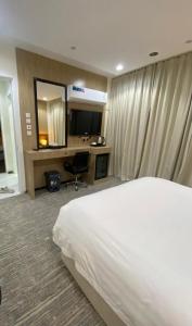 غرفة وصالة فندقية