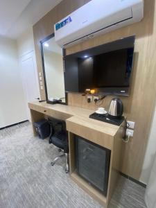 غرفة وصالة فندقية