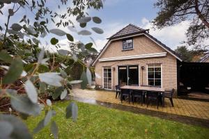 Welkom in ons huisje in het bos met prive sauna