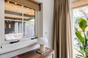 Welkom in ons huisje in het bos met prive sauna