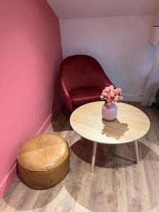 Appartements Maison des Fleurs T2 COSY : photos des chambres