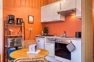 Appartements Deborah studio calme lit et place de parking : photos des chambres