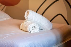 Appartements Deborah studio calme lit et place de parking : photos des chambres
