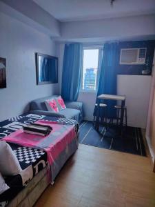 5th Floor Tower D Studio Typed Unit with AC, Netflix and Unlimited Wifi Access