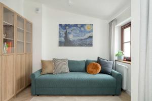 Przestronny Apartament z Biurkiem w Centrum Poznania Blisko Rynku i Parku by Noclegi Renters