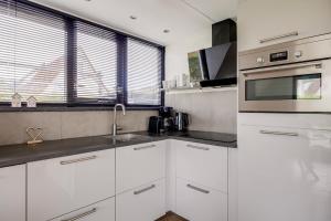 Klapekster I Chique Chalet met Mooi Interieur