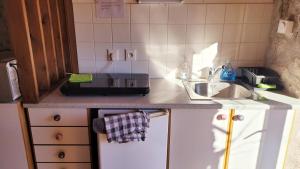 Appartements joli studio dans cuvage d-une maison vigneronne : photos des chambres