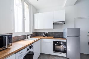 Appartements T2 48m2 neuf, centre ville, 3min a pied de la gare : photos des chambres