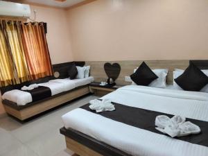 Hotel Sai Laxmi- Walkable Distance from Sai baba Temple