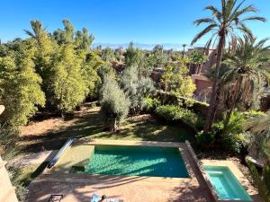 Villa kasbah de luxe, piscine et jacuzzi chauffés, jardin tropical