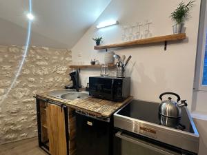 Appartements Le Perchoir : photos des chambres