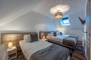 Appartements LOGIS DU GRAND PIN : photos des chambres